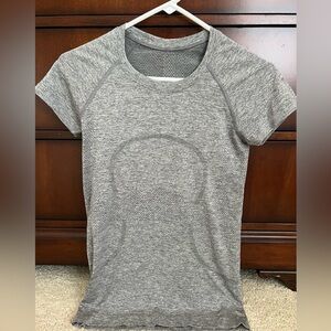 Lululemon swiftly tech short sleeve gray size 4.  Only worn twice!